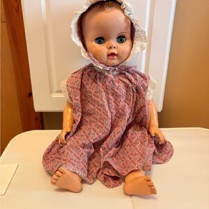 Collector Vintage Vinyl Baby Doll in Pink Floral Dress and White Bonnet